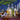 Beverage setup with bottles, glasses, and bar tools on a wooden surface with a blue background.