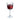 Clear wine glass filled with red wine on a white background