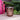 Orange and Cinnamon Scented Candle in a Textured Pink Jar
