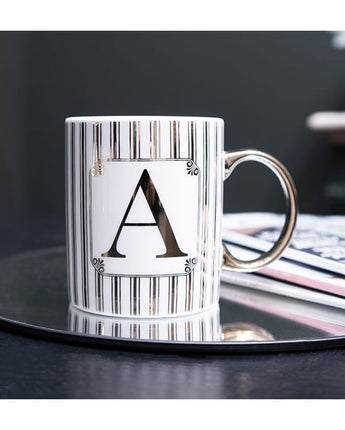 Gold and White Personalised Mug with a Gold Handle and Initial "A" Design