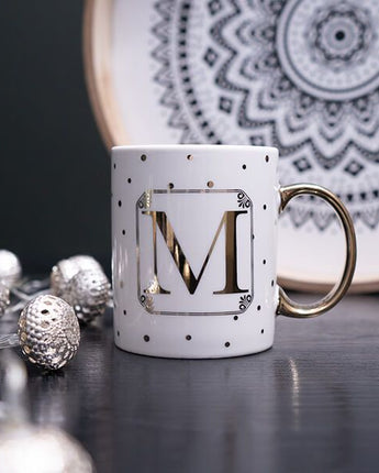 Gold and White Personalised Mug with a Gold Handle and Initial "M" Design