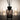 Diffuser bottle with black and white pattern on a blurred background