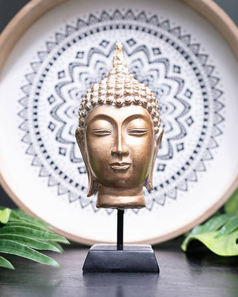 Graceful Gold Buddha on Black Stand