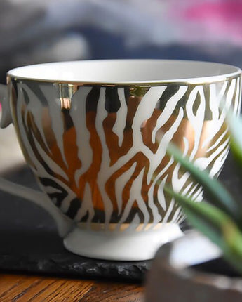 Gold and White Zebra Print Footed Mug with a White Handle