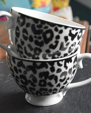 Black and White Leopard Print Footed Mug with a White Handle