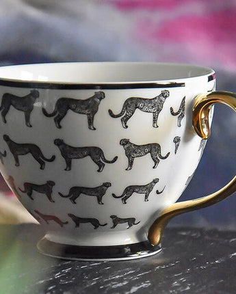 Black and White Cheetah Design Footed Mug with a Gold Handle