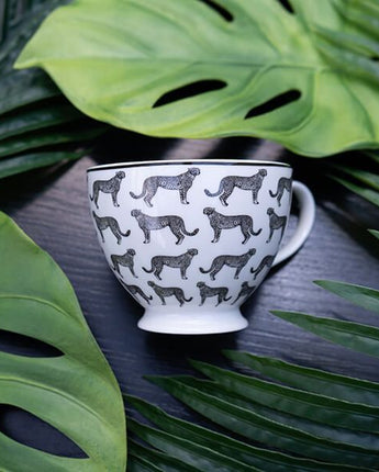 Black and White Cheetah Design Footed Mug with a White Handle