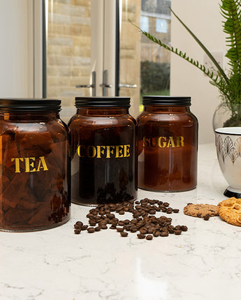 Set of Three Vintage Labelled Glass Storage Jars in Amber Gold