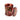 Decorative candle with red glass and apple design on a white background