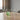 Four clear Menades Hi Ball glasses on a wooden table with a blurred background