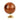 Decorative globe with a orange, burgundy and  gold finish on a white background