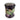 Candle in a decorative jar with fruit design on a white background