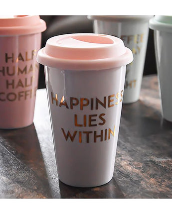 Baby Pink Travel Mug with the Slogan "Happiness Lies Within"