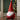 christmas gonk: lifestyle view 2 of the ho ho ho christmas gonk door stop styled in a festive home setting