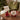 christmas mug: lifestyle view 1 of the red santa mug with lid styled in a festive home setting