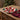 christmas plate: lifestyle view 1 of the 28cm large candy plate in red, white and green styled in a festive home setting