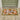 Ciao coir doormat with orange pattern at front door entrance