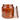An amber glass jar oud candle with a matching glass lid leaning against the side