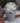 Elegant Lifelike Green Faux Rose in Stylish Grey Pot