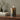 Small green glass LED candles with bird design on a countertop