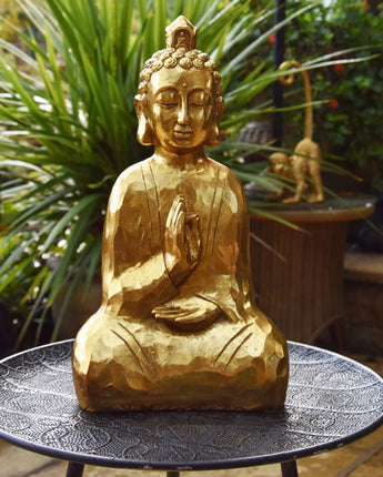 Serene Gold Buddha Carved Statue