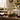 Gold ornament gold metallic fig-shaped ornament, styled in a home setting