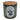 A glass jar candle with a natural cork lid and a white oval label featuring an illustration of a Highland cow.