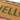 Close-up of Hello text on coir doormat with patterned border