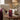 LED candle short LED candle with fig and pomegranate pattern, styled in a home setting alternate view 2