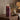 LED candle tall LED candle with fig and pomegranate pattern, styled in a home setting