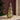 led christmas tree: lifestyle view 1 of the Green 13cm led christmas tree light in green or red styled in a festive home setting