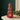 led christmas tree: lifestyle view 1 of the Red 13cm led christmas tree light in green or red styled in a festive home setting