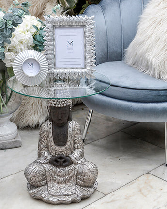 Silver Sitting Buddha Side Table with a Clear Glass Top