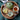 Tea set with a green teapot, cup, and lemon slices on a wooden tray.