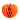 An orange paper pumpkin décor piece with a small brown stem, isolated on a white background.