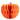 An orange piece of paper pumpkin décor with a textured accordion pattern and a small brown stem