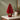 paper christmas tree: lifestyle view 1 of the 25cm standing santa tree decoration styled in a festive home setting