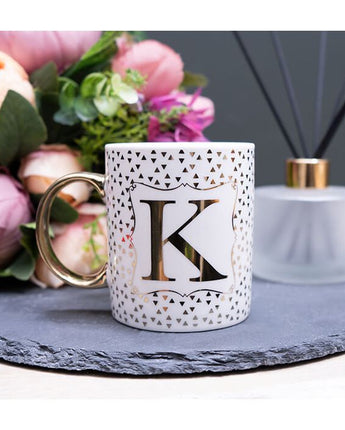 Gold and White Personalised Mug with a Gold Handle and Initial "K" Design