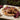 Pizza tray mango wood pizza tray with handle and enamel fruit pattern, styled in a home setting
