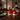 salt and pepper pots: lifestyle view 1 of the santa hat salt and pepper pots in gift box styled in a festive home setting