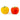 Red and yellow salt and pepper shakers on a white background.