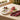Serving tray rectangular ceramic fig and pomegranate serving tray, styled in a home setting