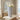 Decorative vase with flowers on a table in a bright room