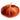 A top view of a pumpkin cushion against a plain white background