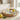 Wooden round tray with lemon drink and fruit styled on kitchen countertop