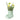 Green ceramic boot-shaped planter with plants on a white background