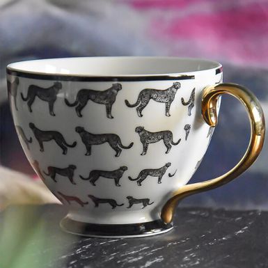 Black and White Cheetah Design Footed Mug with a Gold Handle