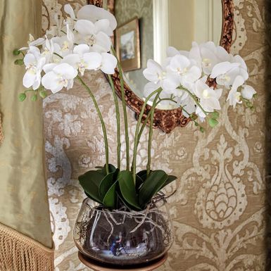 White Artificial Faux Orchid in a Transparent Glass Fishbowl