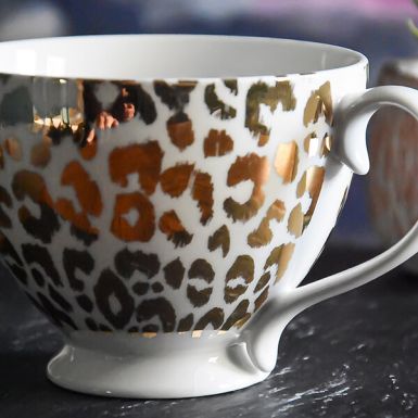 Gold and White Leopard Print Footed Mug with a White Handle